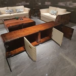 Refined TV Stand with Quilted Upholstered Panels, Natural Wood Veneer Finish and Brushed Stainless Steel Handles